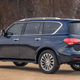 Illustration for article titled 2015 Infiniti QX80 Gets A Facelift, Still Looks Like A Cyborg Bull